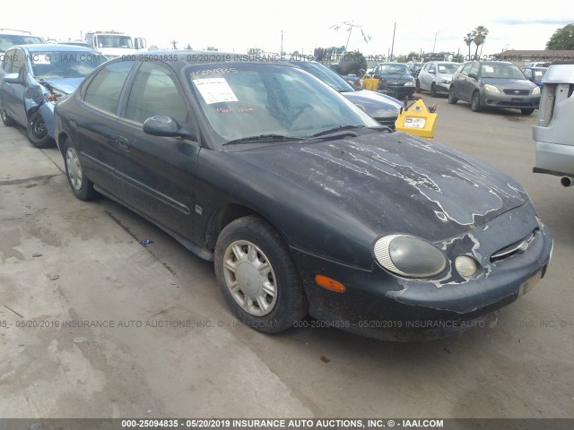 1FAFP52SXWG275219 - 1998 FORD TAURUS LX/SE GREEN photo 1