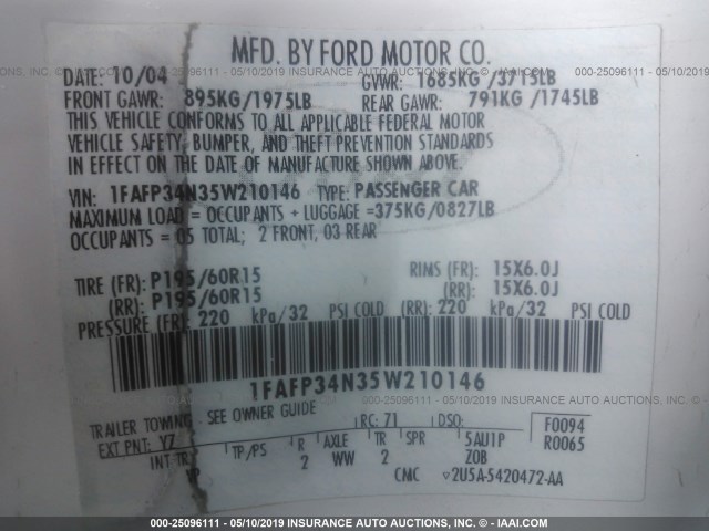 1FAFP34N35W210146 - 2005 FORD FOCUS ZX4 WHITE photo 9