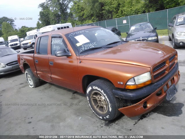 1B7GL2AX7YS727486 - 2000 DODGE DAKOTA QUAD ORANGE photo 1