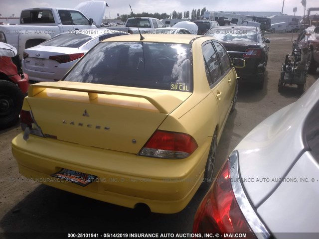 JA3AJ86E22U077031 - 2002 MITSUBISHI LANCER OZ RALLY YELLOW photo 4