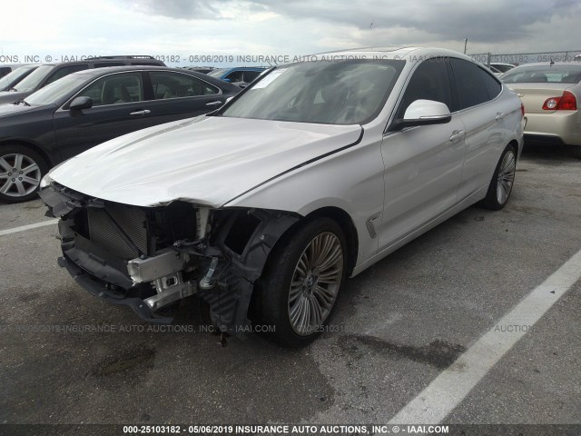 WBA3X9C58ED152786 - 2014 BMW 335 XIGT WHITE photo 2