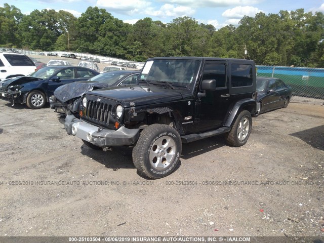 1J8FA541X9L755104 - 2009 JEEP WRANGLER SAHARA BLACK photo 2