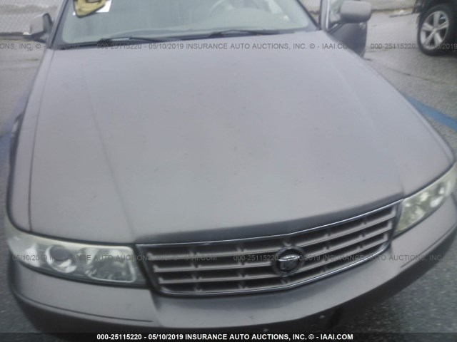 1G6KY5499XU906662 - 1999 CADILLAC SEVILLE STS BEIGE photo 6