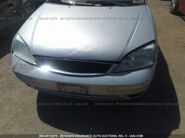 1FAFP37N76W242885 - 2006 FORD FOCUS ZX5 SILVER photo 6