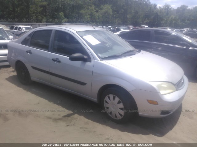 1FAFP34N75W104833 - 2005 FORD FOCUS ZX4 SILVER photo 1