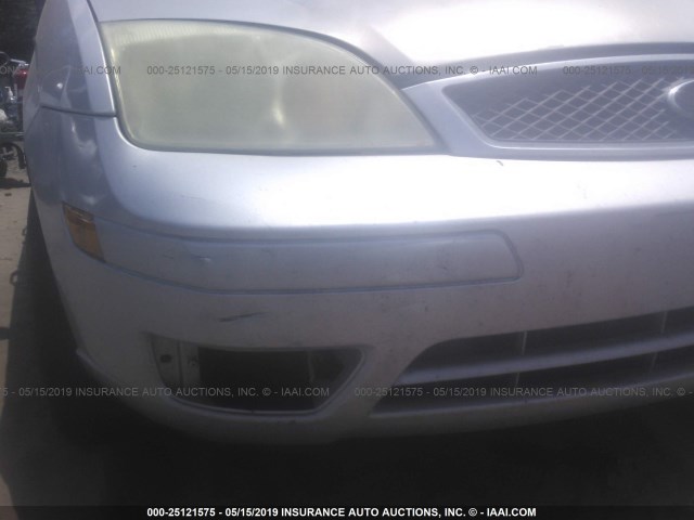 1FAFP34N75W104833 - 2005 FORD FOCUS ZX4 SILVER photo 6