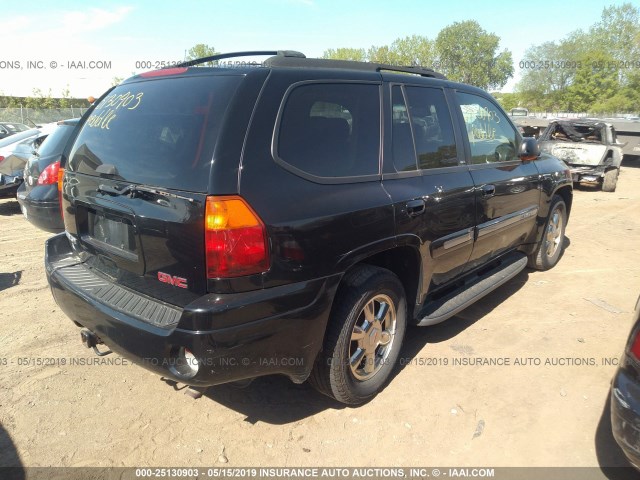 1GKDT13S022323214 - 2002 GMC ENVOY BLACK photo 4