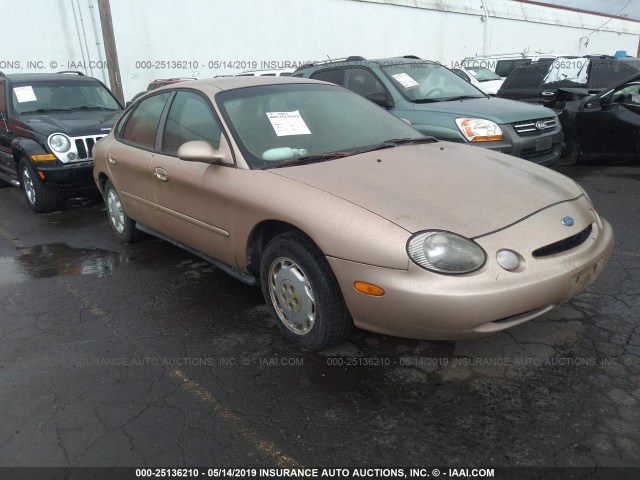 1FALP52UXVG281671 - 1997 FORD TAURUS GL GOLD photo 1