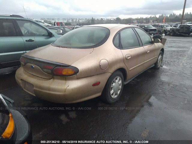 1FALP52UXVG281671 - 1997 FORD TAURUS GL GOLD photo 4