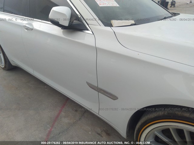 WBAYA8C56DC996606 - 2013 BMW 750 WHITE photo 6