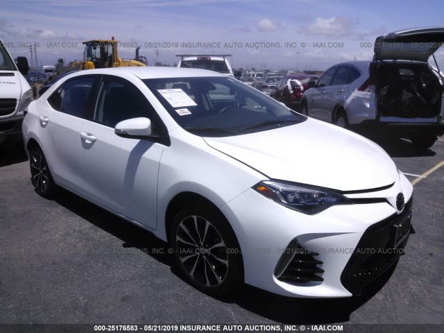 5YFBURHE9JP748786 - 2018 TOYOTA COROLLA L/LE/XLE/SE/XSE WHITE photo 1