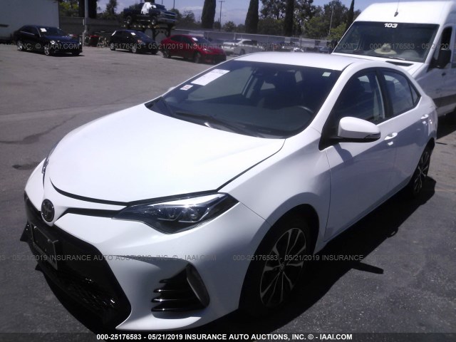 5YFBURHE9JP748786 - 2018 TOYOTA COROLLA L/LE/XLE/SE/XSE WHITE photo 2