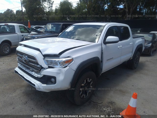 3TMCZ5AN7GM006573 - 2016 TOYOTA TACOMA DBL CAB/SR/SR5/TRD SPT/OR WHITE photo 2