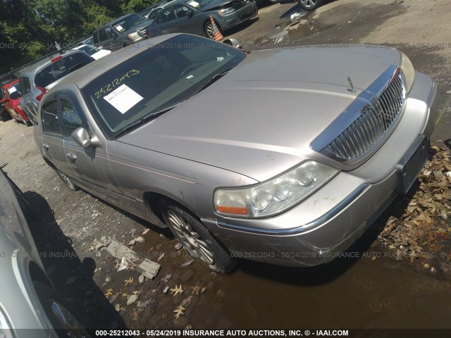 1LNHM81W43Y604399 - 2003 LINCOLN TOWN CAR EXECUTIVE SILVER photo 1