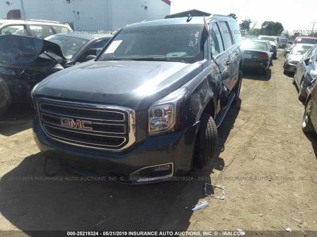 1GKS2GKC2KR271857 - 2019 GMC YUKON XL K1500 SLT GRAY photo 2