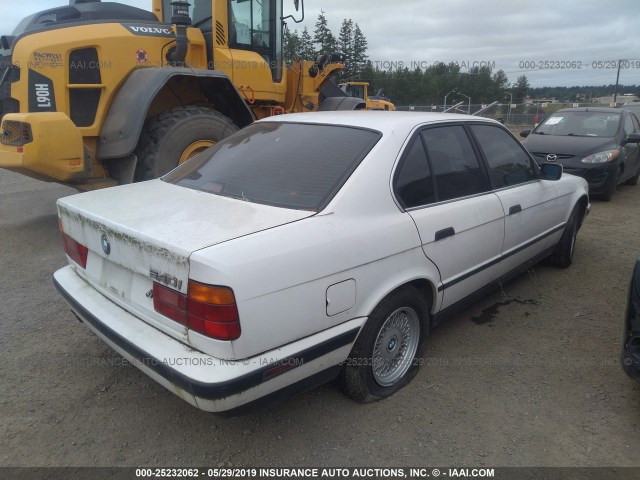 WBAHE6319RGF26188 - 1994 BMW 540 I AUTOMATIC WHITE photo 4