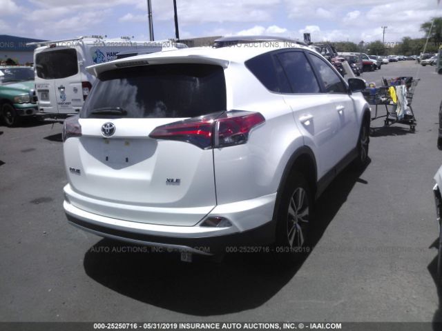 JTMWFREV0JJ751824 - 2018 TOYOTA RAV4 ADVENTURE/XLE White photo 4