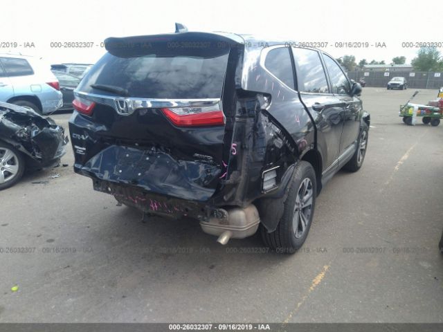 2HKRW6H30JH230584 - 2018 HONDA CR-V LX Gray photo 4