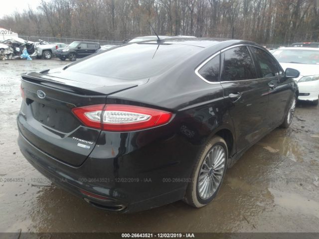 3FA6P0D90FR308816 - 2015 FORD FUSION TITANIUM Black photo 4