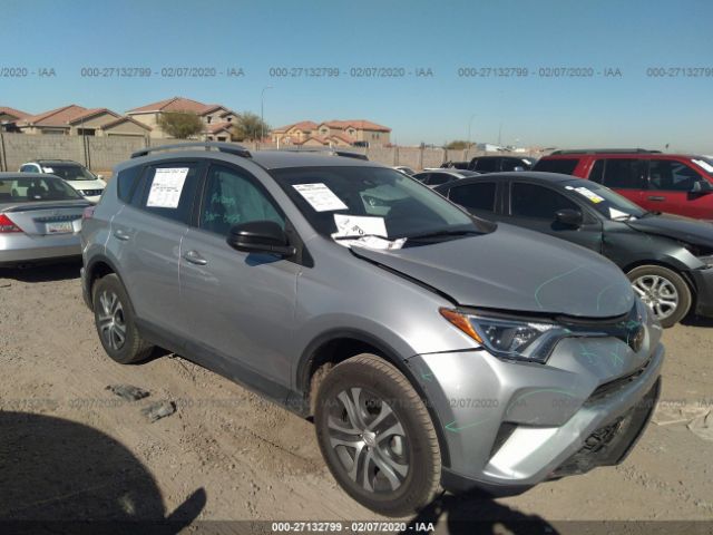 2T3ZFREV4JW515157 - 2018 TOYOTA RAV4 LE Silver photo 1