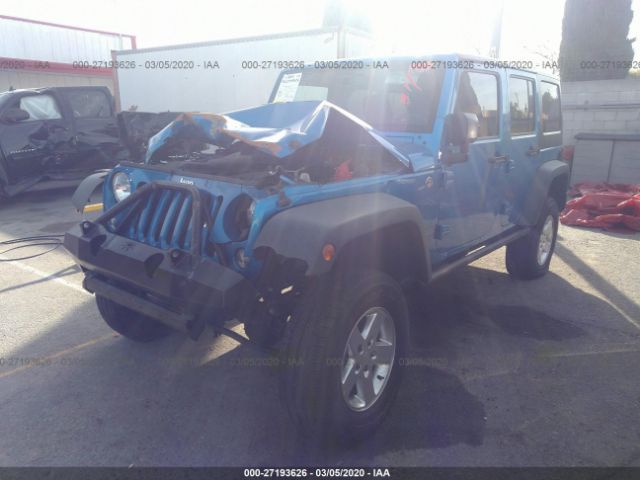 1C4BJWDG8FL640562 - 2015 JEEP WRANGLER UNLIMITE SPORT Blue photo 2