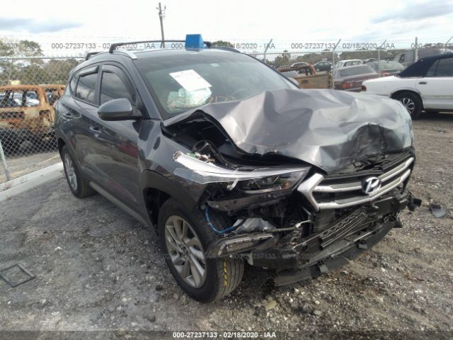 KM8J33A42HU341799 - 2017 HYUNDAI TUCSON LIMITED/SPORT AND ECO/SE Gray photo 1