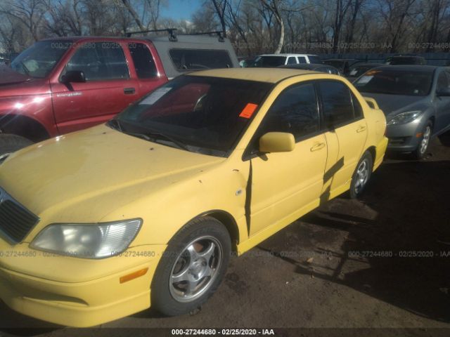 JA3AJ86E53U120312 - 2003 MITSUBISHI LANCER OZ RALLY Yellow photo 2