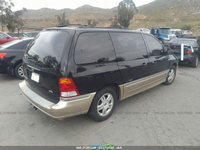 2FMZA53471BA82952 - 2001 FORD WINDSTAR SEL Black photo 4