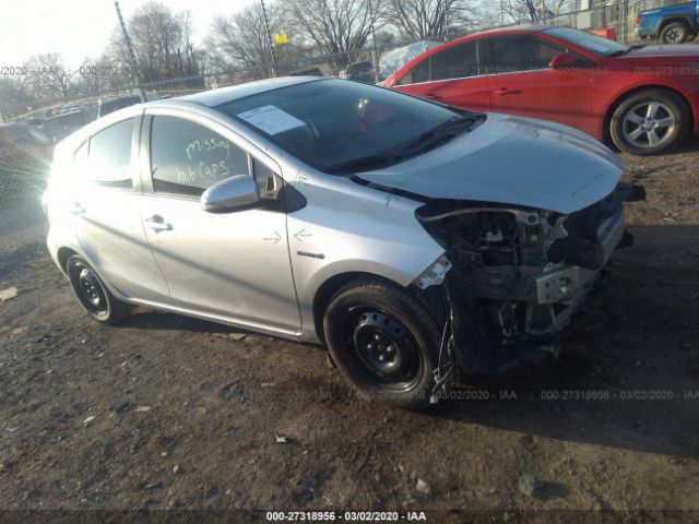 JTDKDTB30F1577636 - 2015 TOYOTA PRIUS C  Silver photo 1