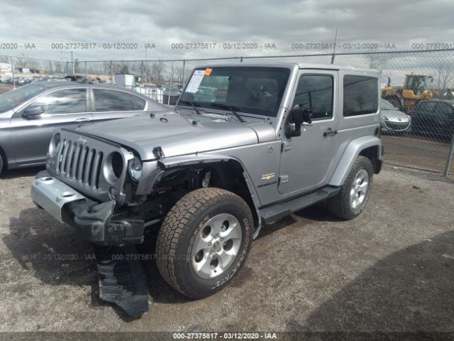 1C4AJWBG2FL770688 - 2015 JEEP WRANGLER SAHARA Silver photo 2