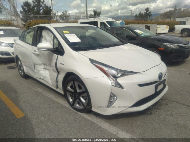 JTDKARFU0H3038780 - 2017 TOYOTA PRIUS  White photo 1