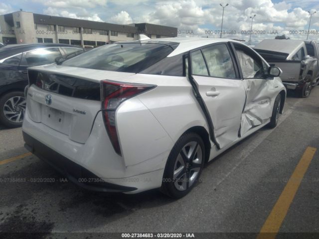 JTDKARFU0H3038780 - 2017 TOYOTA PRIUS  White photo 4