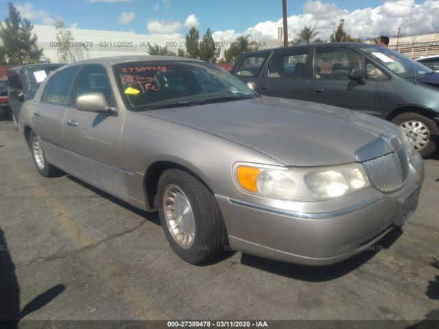 1LNHM81W0XY694611 - 1999 LINCOLN TOWN CAR EXECUTIVE Champagne photo 1