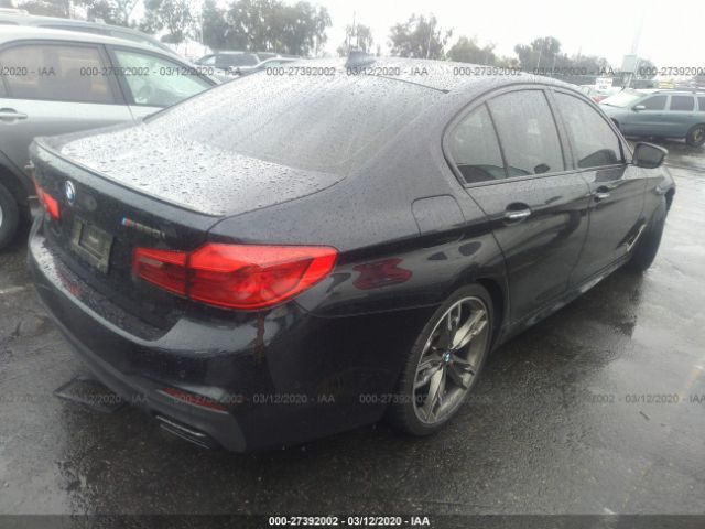 WBAJB9C52JB286415 - 2018 BMW M550XI  Black photo 4