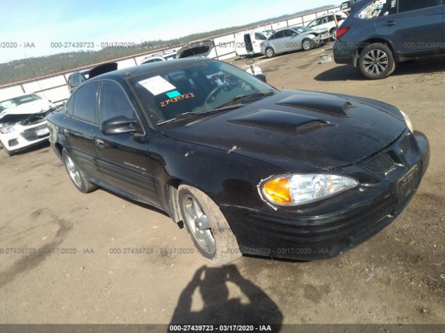 1G2NE52T7XM944879 - 1999 PONTIAC GRAND AM SE Black photo 1