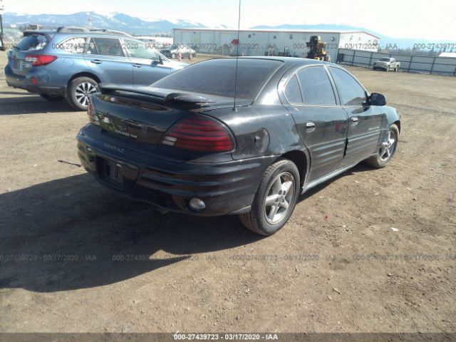 1G2NE52T7XM944879 - 1999 PONTIAC GRAND AM SE Black photo 4