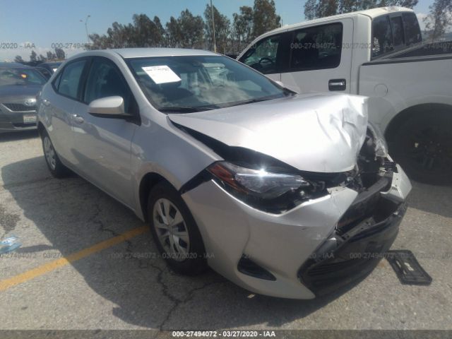 5YFBURHE0HP590056 - 2017 TOYOTA COROLLA L/LE/XLE/SE/XSE Silver photo 1