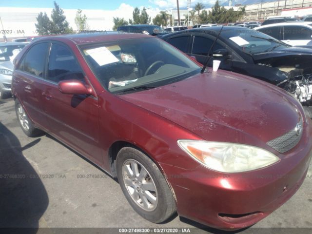 JTDBE32K220064845 - 2002 TOYOTA CAMRY LE/XLE/SE Red photo 1