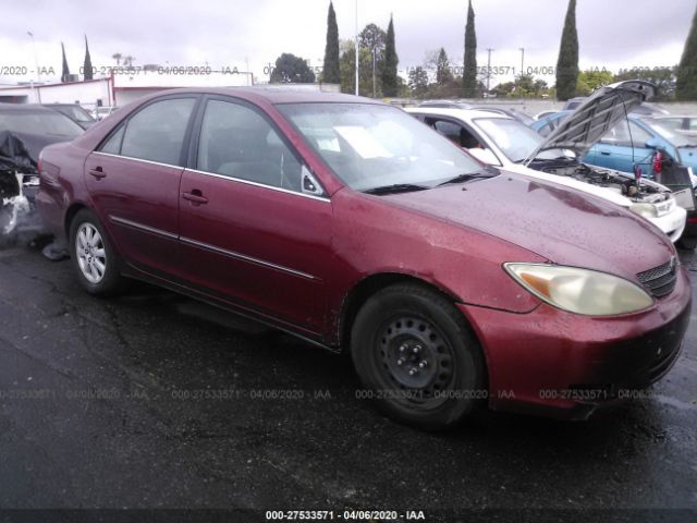 JTDBE32K120067669 - 2002 TOYOTA CAMRY LE/XLE/SE Red photo 1