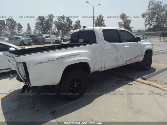 3TMBZ5DN7KM021073 - 2019 TOYOTA TACOMA DOUBLE CAB/SR5/TRD SPORT White photo 4