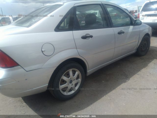 1FAFP34N45W290427 - 2005 FORD FOCUS ZX4 Silver photo 6