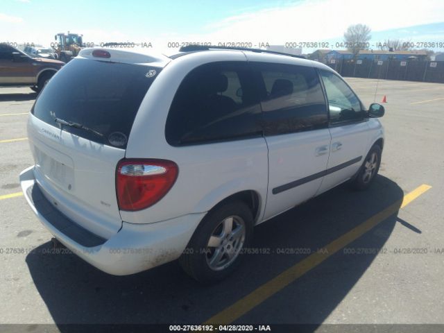 1D4GP45R55B204073 - 2005 DODGE CARAVAN SXT White photo 4